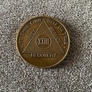 Vintage AA 23 year medallion/chip